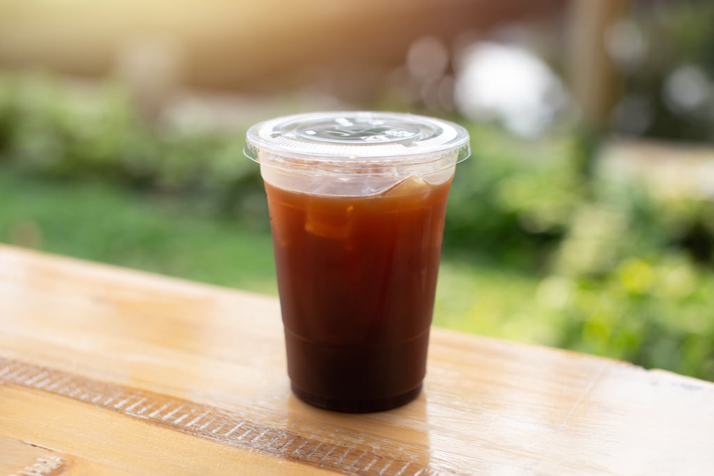 Iced americano in a plastic mug